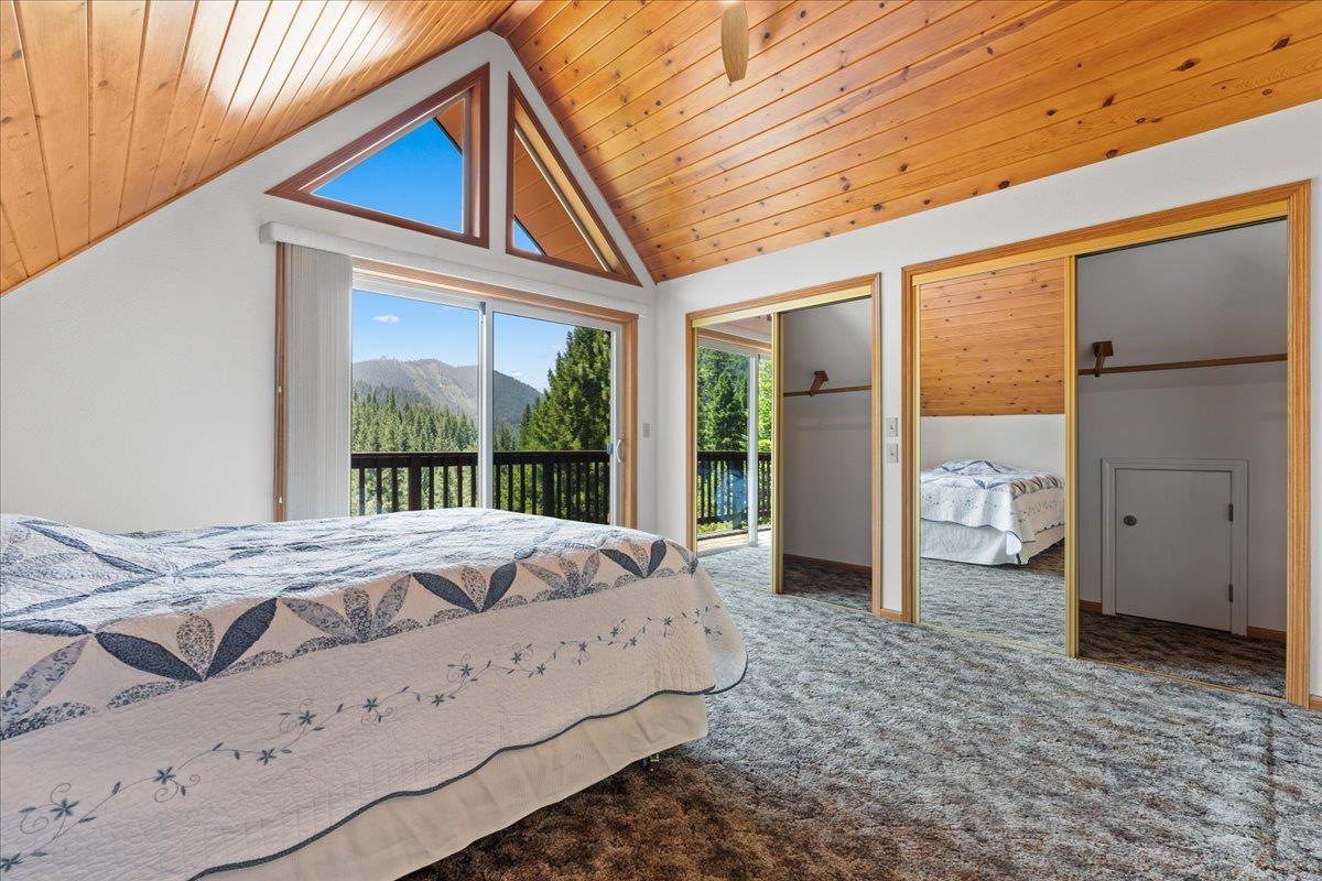 200 Craycroft Ridge Road Downieville, CA 95936 - Photo 15 of 39 a bed sitting in a bedroom next to a window