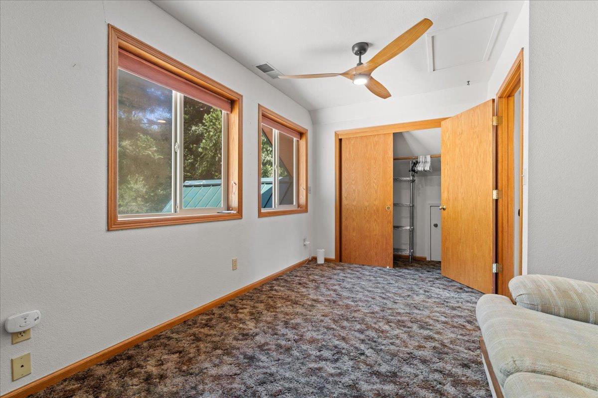 200 Craycroft Ridge Road Downieville, CA 95936 - Photo 17 of 39 a bedroom with a bed and a window