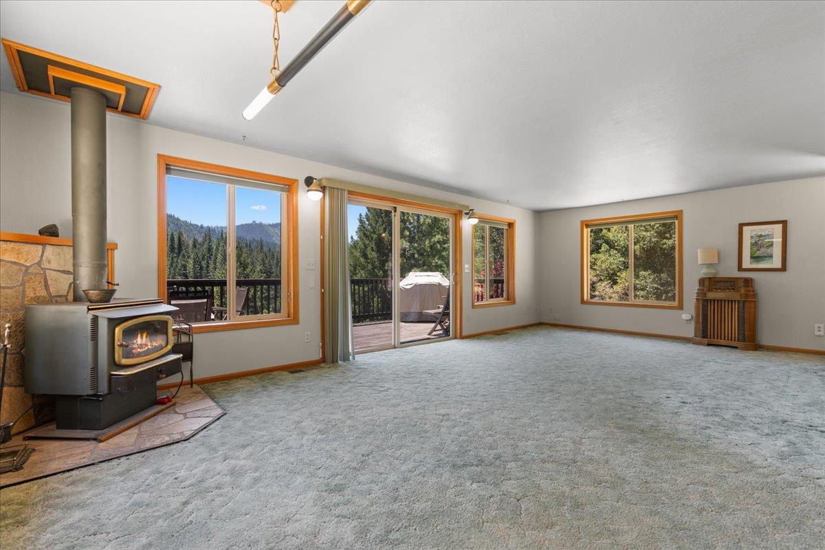 200 Craycroft Ridge Road Downieville, CA 95936 - Photo 6 of 34 a living room with furniture and large windows