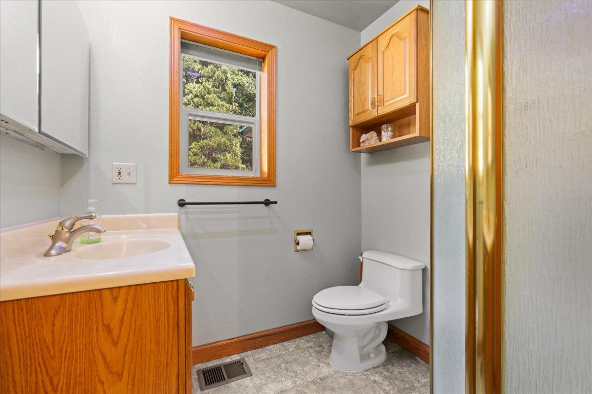 200 Craycroft Ridge Road Downieville, CA 95936 - Photo 10 of 34 a bathroom with a sink a toilet and a mirror