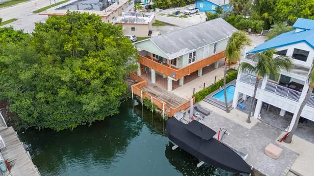 $925,000 | 102 Snapper Creek Drive, Layton, FL 33001