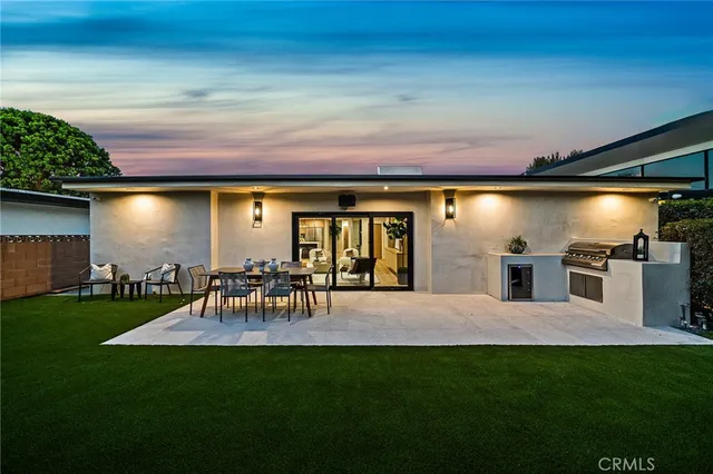 a view of a back yard of the house