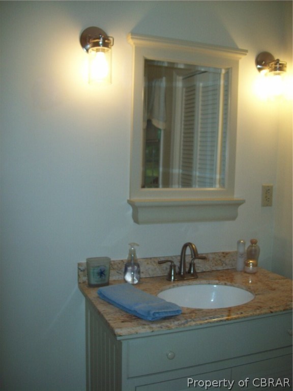 195 Hurst Neck Road Onemo, VA 23130 - Photo 22 of 30 a bathroom with a sink and a mirror