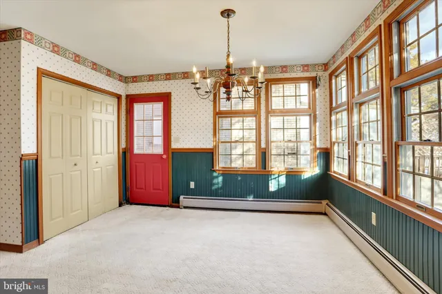 an empty room with windows