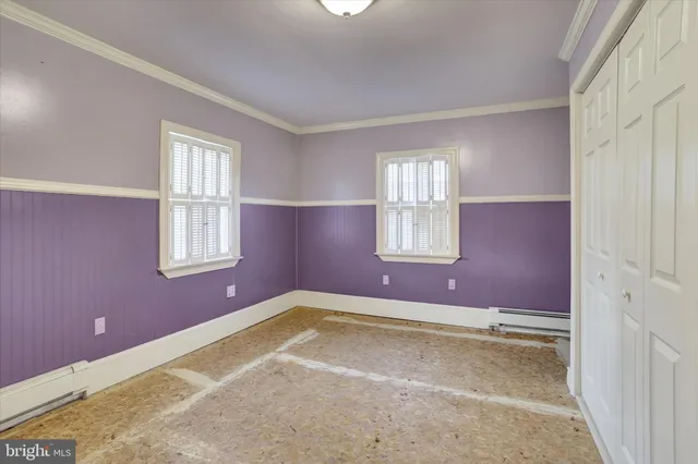 an empty room with closet