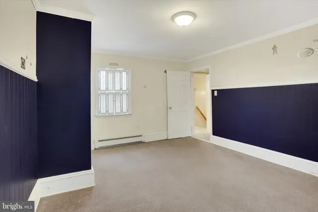 a bathroom with a sink mirror toilet and shower