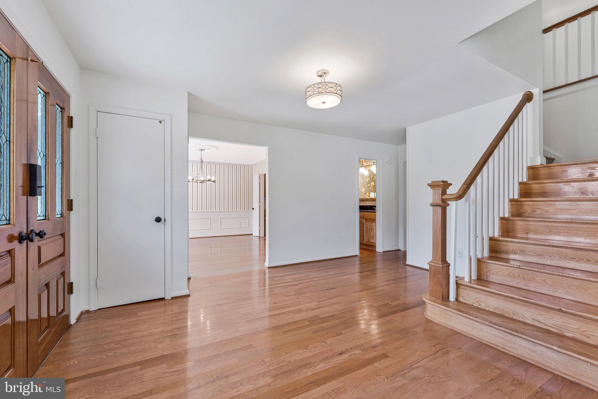 7730 Falstaff Road McLean, VA 22102 - Photo 7 of 83 Gracious front foyer leads to dining room