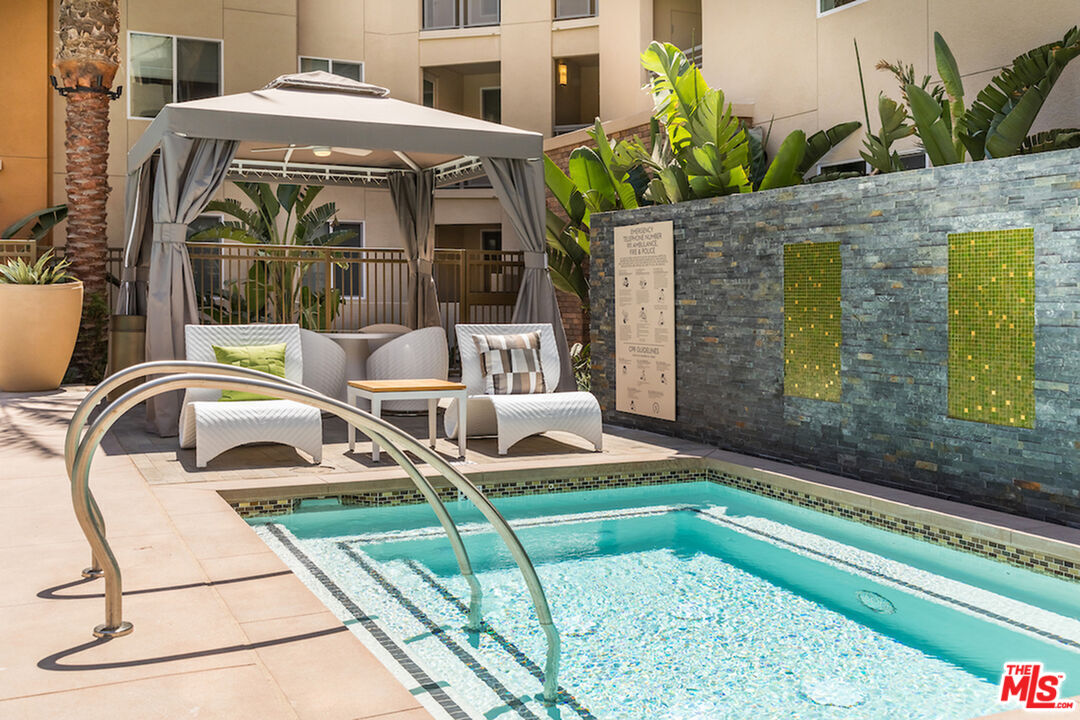 7290 Edinger Avenue, Unit 4038 Huntington Beach, CA 92647 - Photo 18 of 24 a house view with a outdoor space