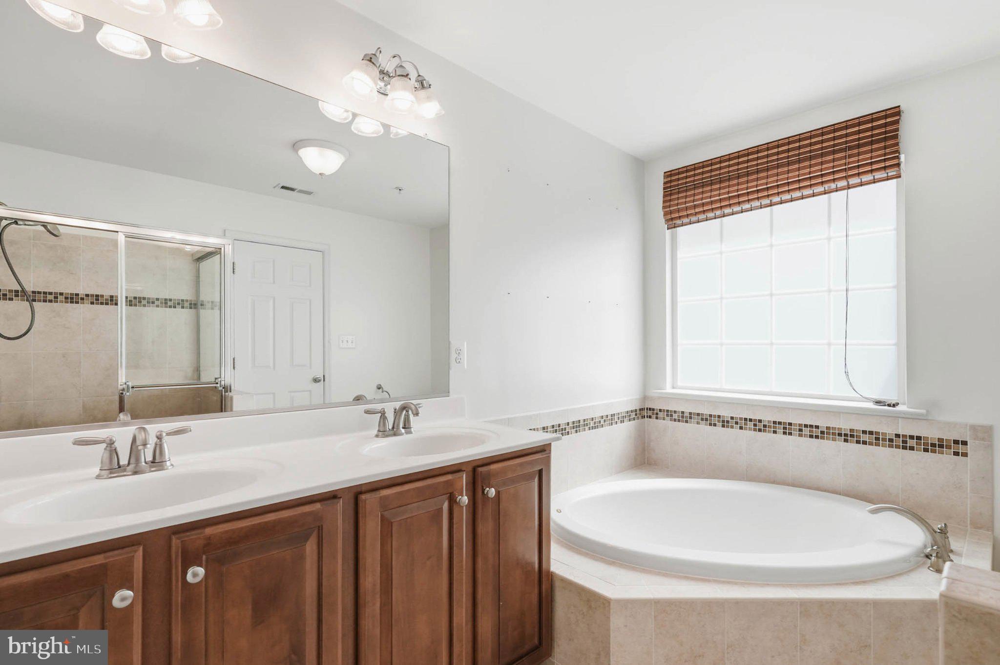 677 Tivoli Road Frederick, MD 21703 - Photo 16 of 39 Primary full bath w/ soaking tub