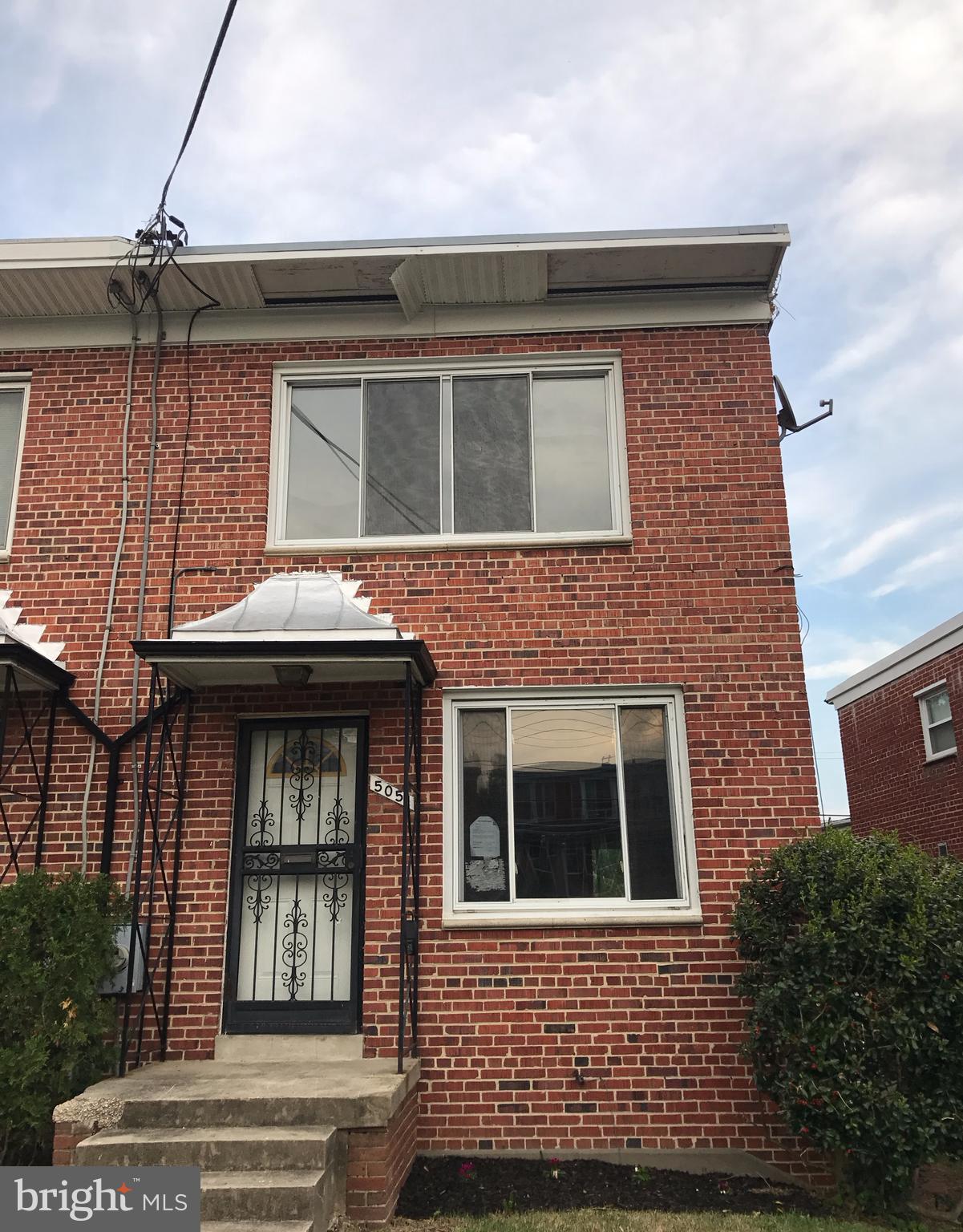 5051 Sargent Road Northeast Washington, DC 20017 - Photo 1 of 11 a front view of a house