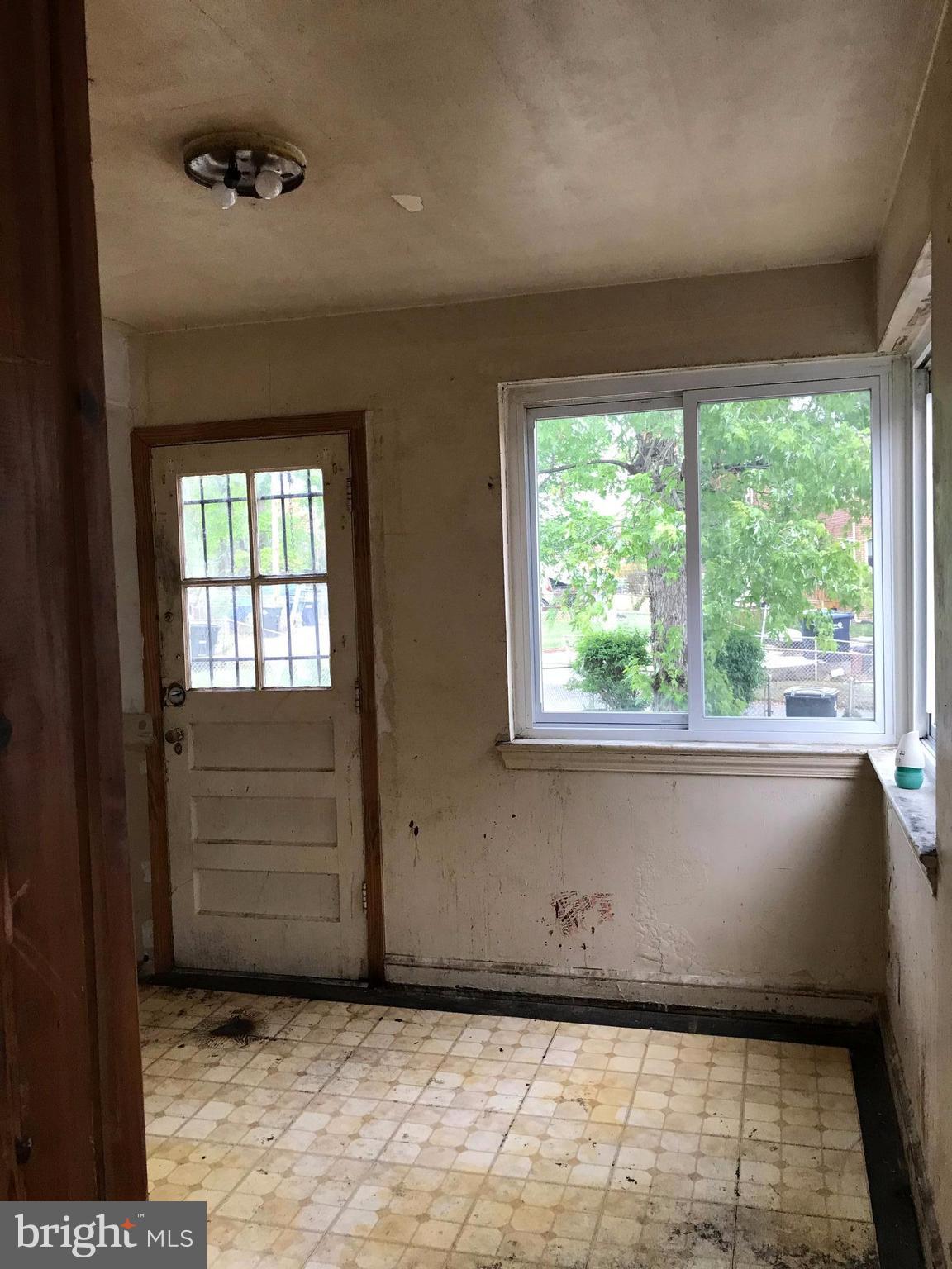 5051 Sargent Road Northeast Washington, DC 20017 - Photo 5 of 11 a view of a livingroom with a window