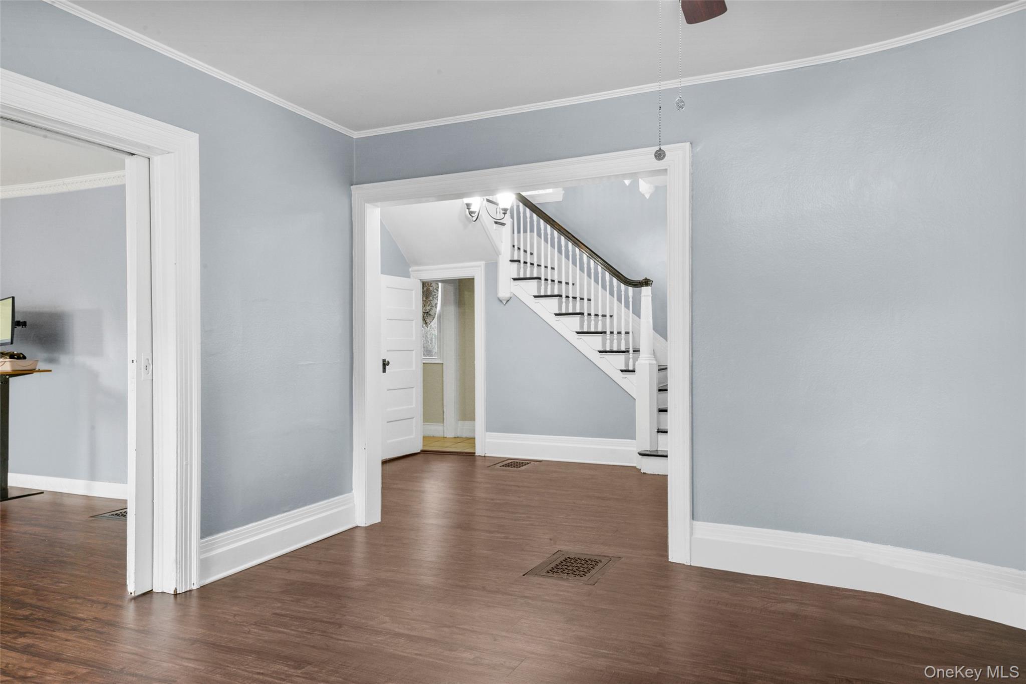 8 The Serpentine New Rochelle, NY 10801 - Photo 14 of 48 a view of entryway with wooden floor