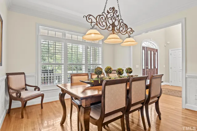 a bedroom with a bed and a mirror