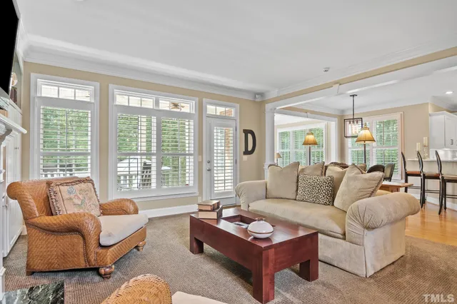 a kitchen with a stove a sink and a refrigerator