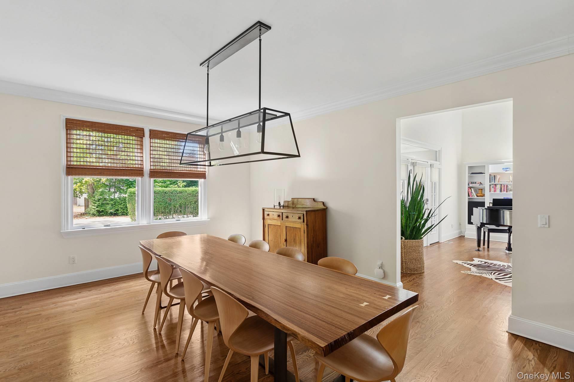 10 Bayview Road Southampton, NY 11968 - Photo 12 of 39 a view of a dining room with furniture window and wooden floor