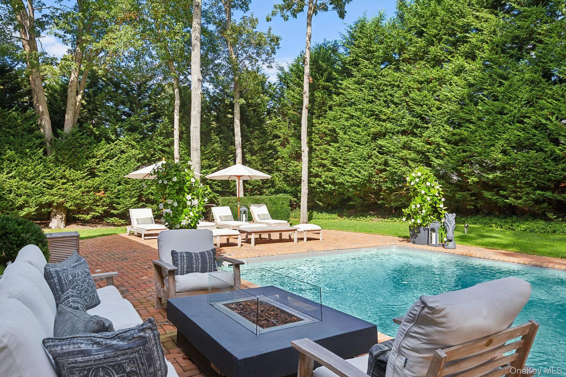 10 Bayview Road Southampton, NY 11968 - Photo 5 of 39 a view of a backyard with sitting area