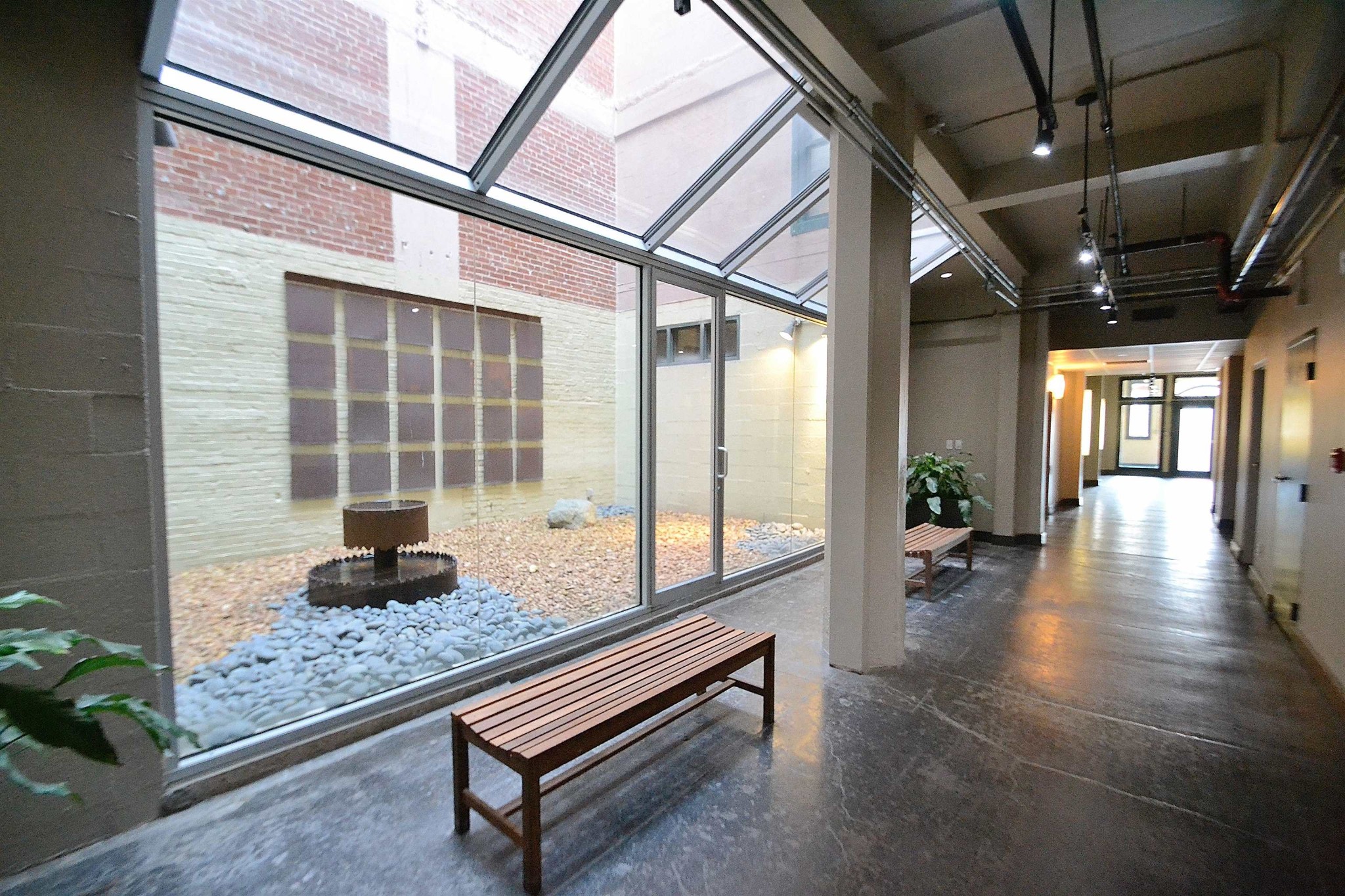 408 South Front Street, Unit 412 Memphis, TN 38103 - Photo 13 of 21 a lobby with furniture and floor to ceiling window