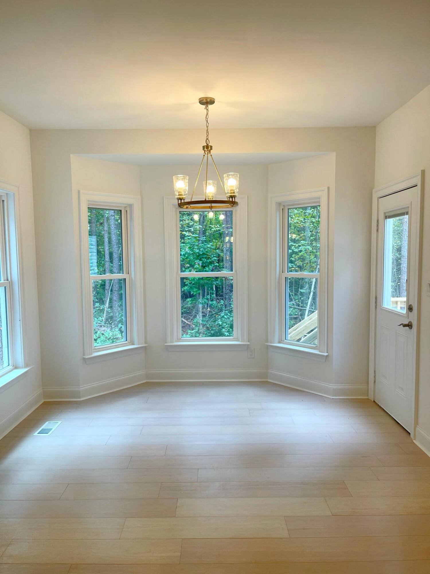 0 Haymakertown Road Troutville, VA 24175 - Photo 8 of 10 an empty room with windows and chandelier