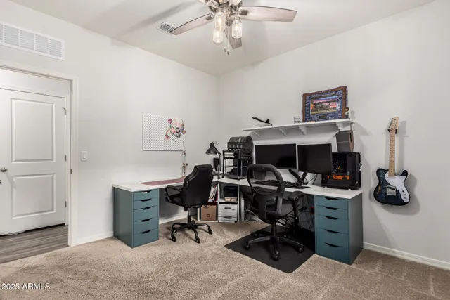 a view of a workspace with furniture