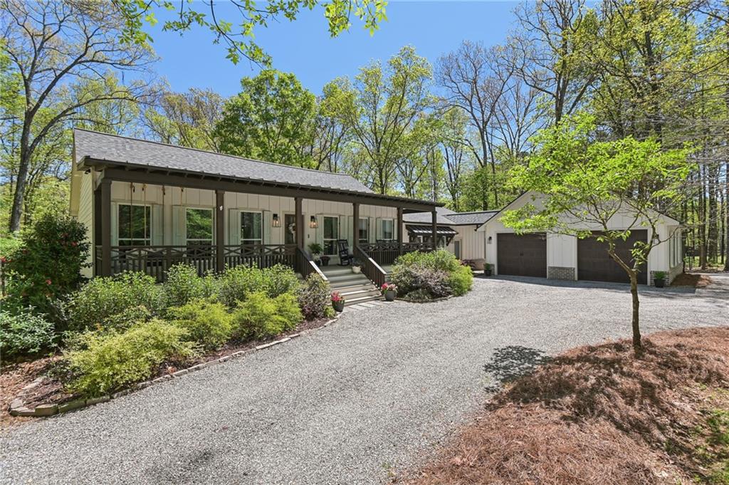 16605 Westbrook Road Alpharetta, GA 30004 - Photo 1 of 1 a view of a house with a street