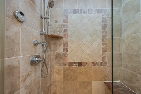 a view of a hallway with washer and dryer