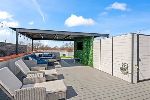 a view of a backyard with a garden and plants