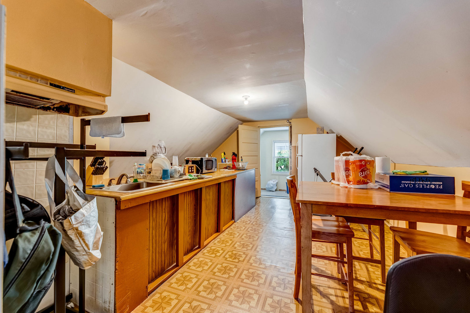 2328 West 19th Street Chicago, IL 60608 - Photo 15 of 31 a view of a kitchen with furniture and a kitchen