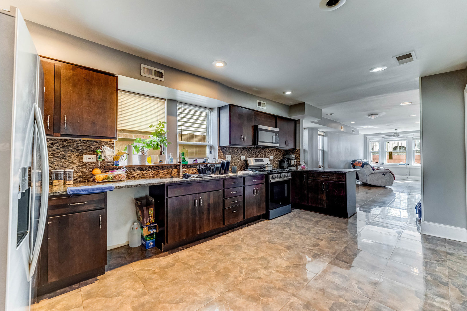 2328 West 19th Street Chicago, IL 60608 - Photo 4 of 31 a kitchen with a refrigerator and a sink