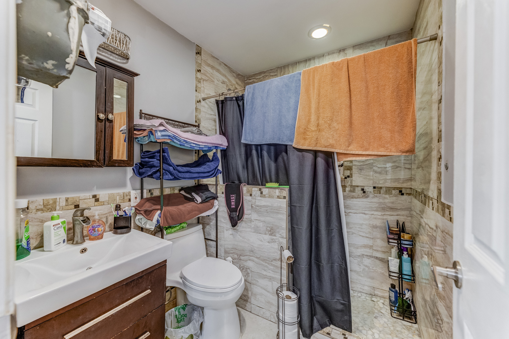 2328 West 19th Street Chicago, IL 60608 - Photo 8 of 31 a bathroom with a sink toilet and shower