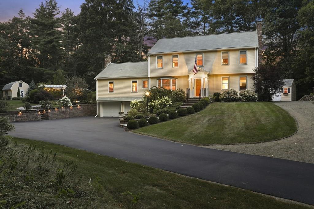 8 Curtis Road Boxford, MA 01921 - Photo 1 of 42 a view of a white house next to a yard with large trees