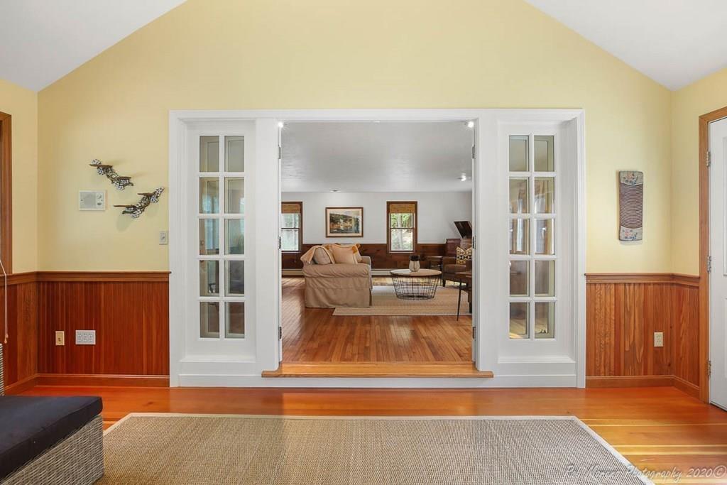 8 Curtis Road Boxford, MA 01921 - Photo 14 of 42 a living room with furniture and a rug