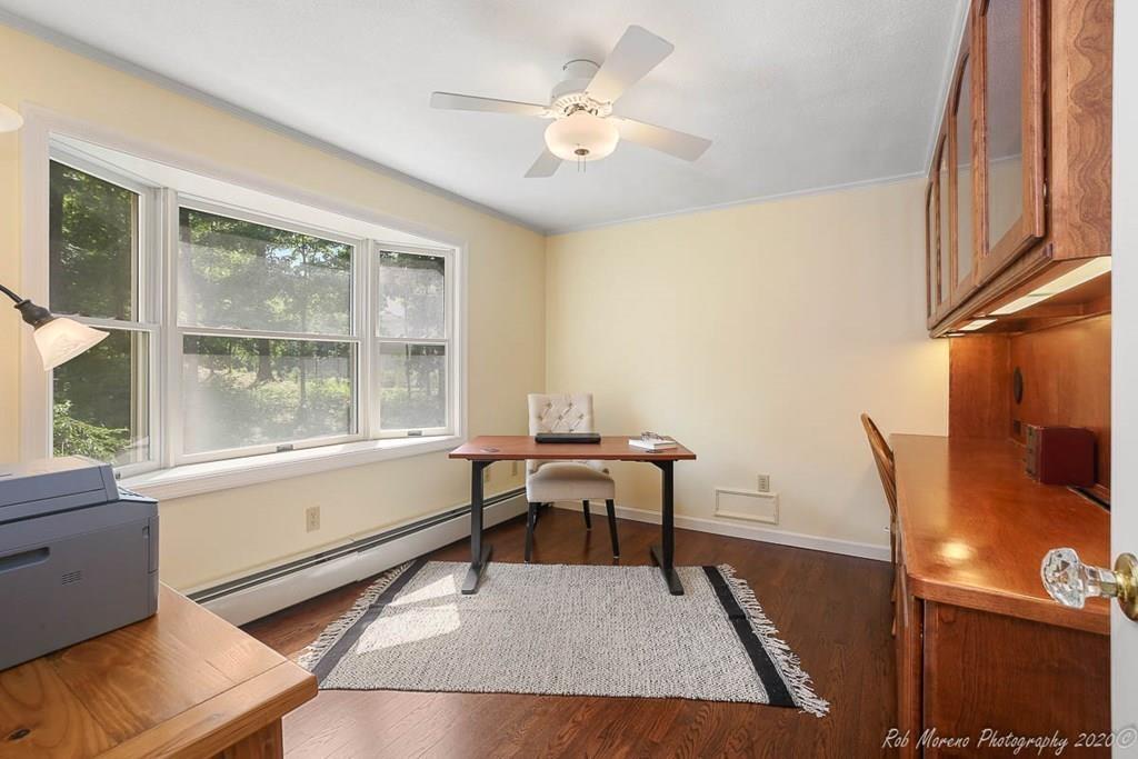 8 Curtis Road Boxford, MA 01921 - Photo 18 of 42 a view of a workspace with furniture and a window