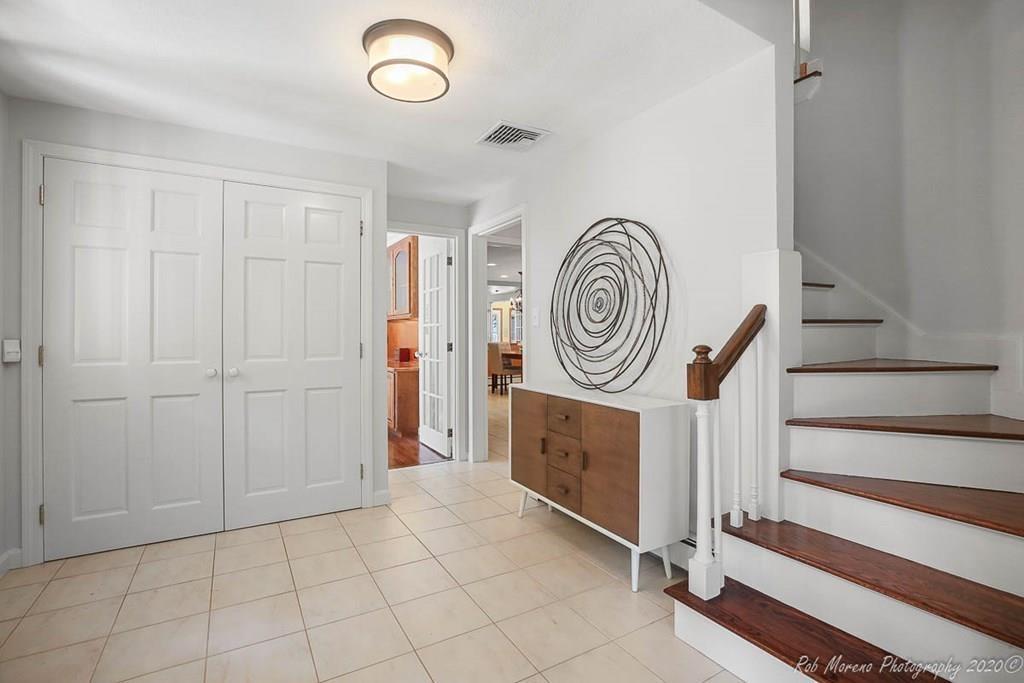 8 Curtis Road Boxford, MA 01921 - Photo 19 of 42 a view of a hallway with washer and dryer