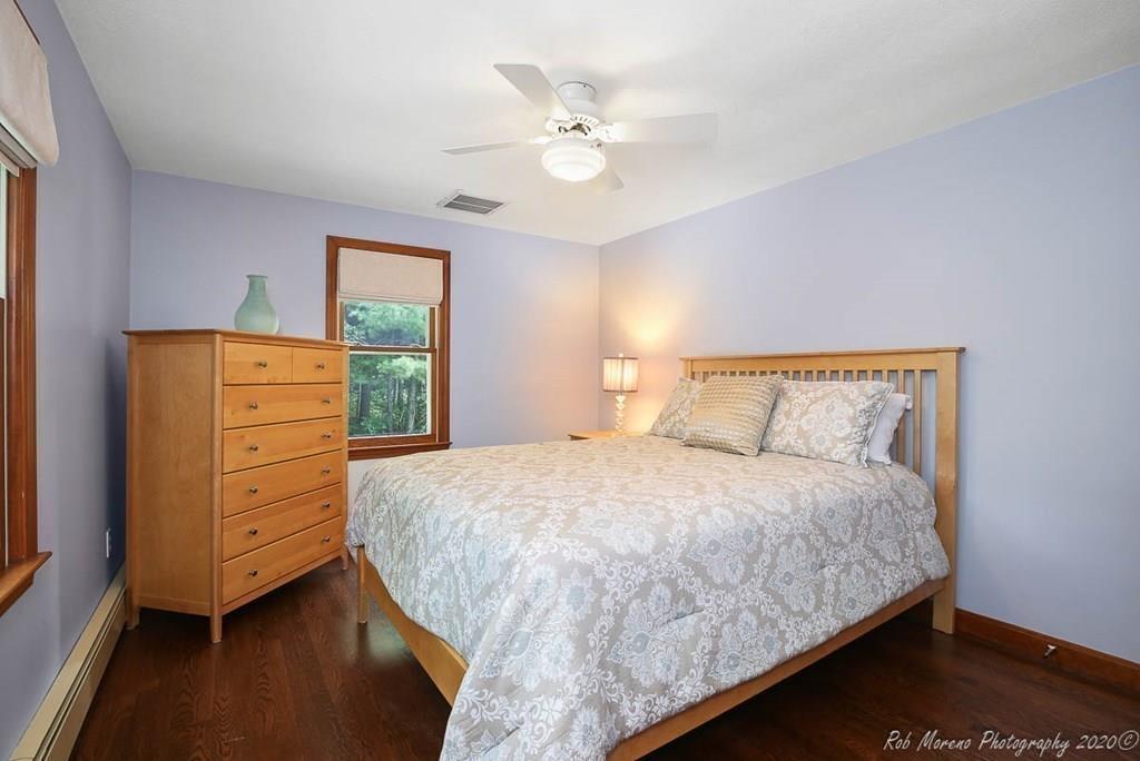 8 Curtis Road Boxford, MA 01921 - Photo 21 of 42 a bedroom with a bed and a dresser