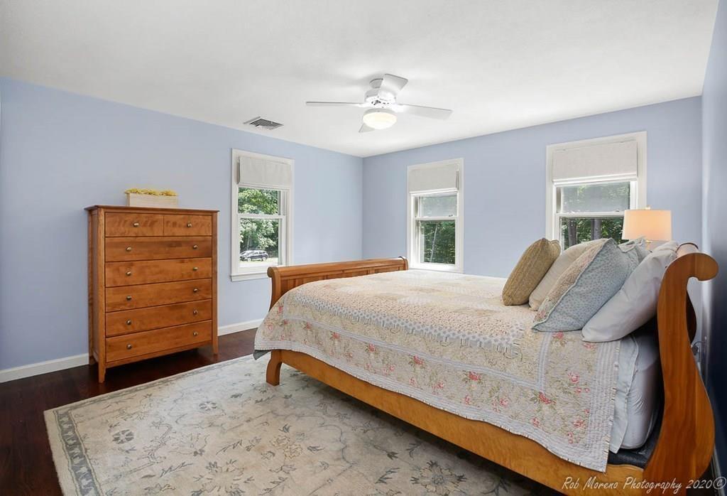 8 Curtis Road Boxford, MA 01921 - Photo 22 of 42 a bedroom with a bed and a dresser