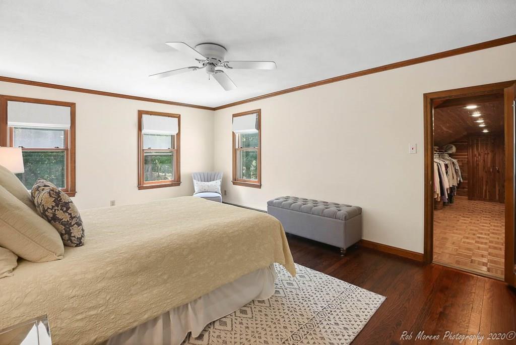 8 Curtis Road Boxford, MA 01921 - Photo 23 of 42 a bedroom with a bed and a couch