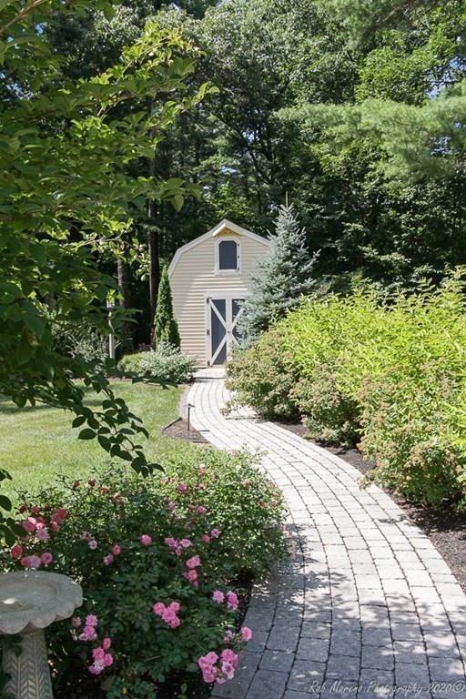 8 Curtis Road Boxford, MA 01921 - Photo 36 of 42 a view of a garden with a fountain