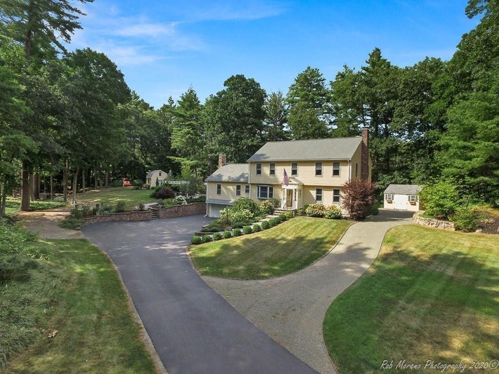 8 Curtis Road Boxford, MA 01921 - Photo 42 of 42 a aerial view of a house with a yard table and chairs
