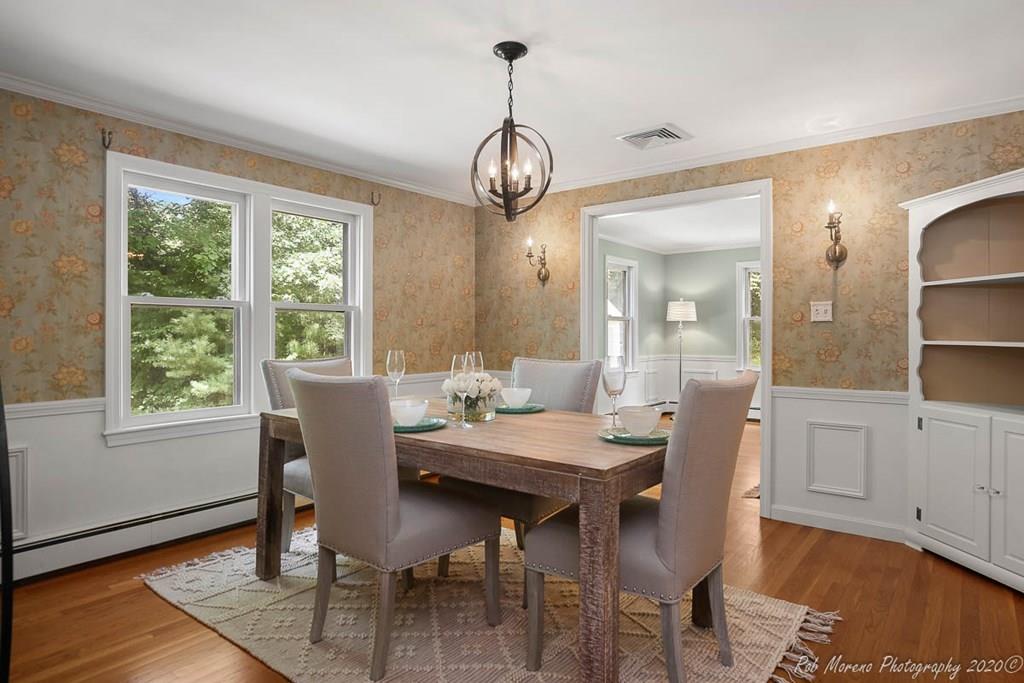 8 Curtis Road Boxford, MA 01921 - Photo 6 of 42 a view of a dining room with furniture window and wooden floor