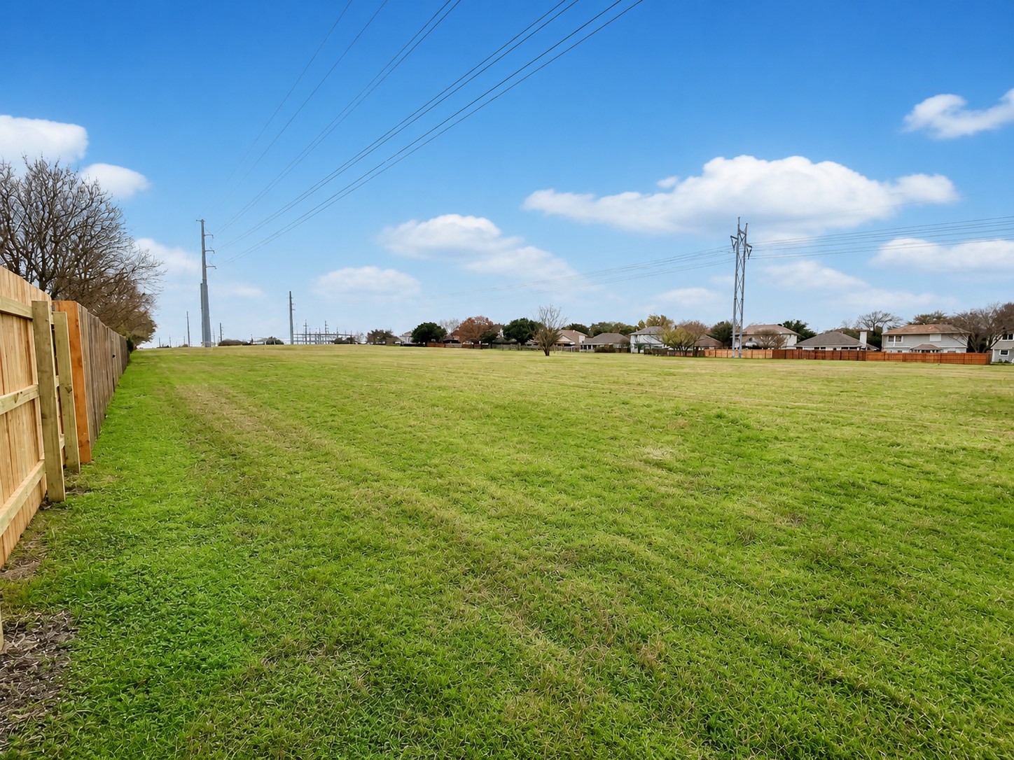 14828 Single Trace Austin, TX 78728 - Photo 29 of 30 Expansive grassy lot bordered by a new wood privacy fence