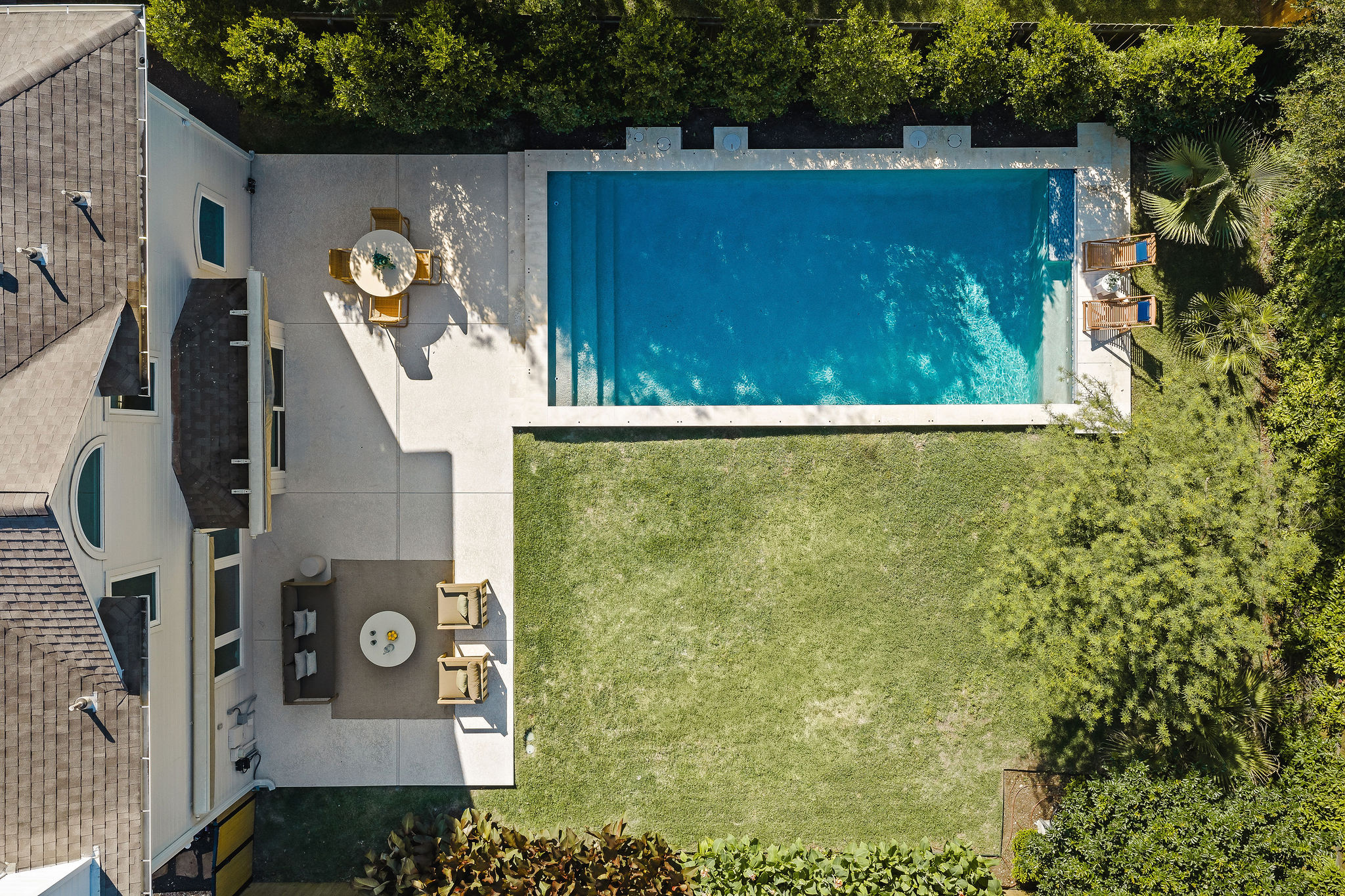 6500 Clay Allison Pass Austin, TX 78749 - Photo 3 of 39 Expansive outdoor space featuring a rectangular swimming pool, concrete patio, and manicured lawn