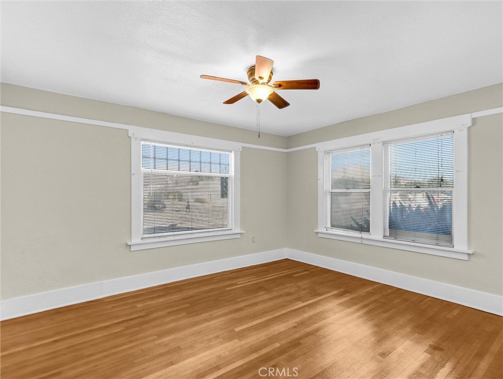 73 South Michigan Avenue Pasadena, CA 91106 - Photo 5 of 17 a view of an empty room with a window and wooden floor