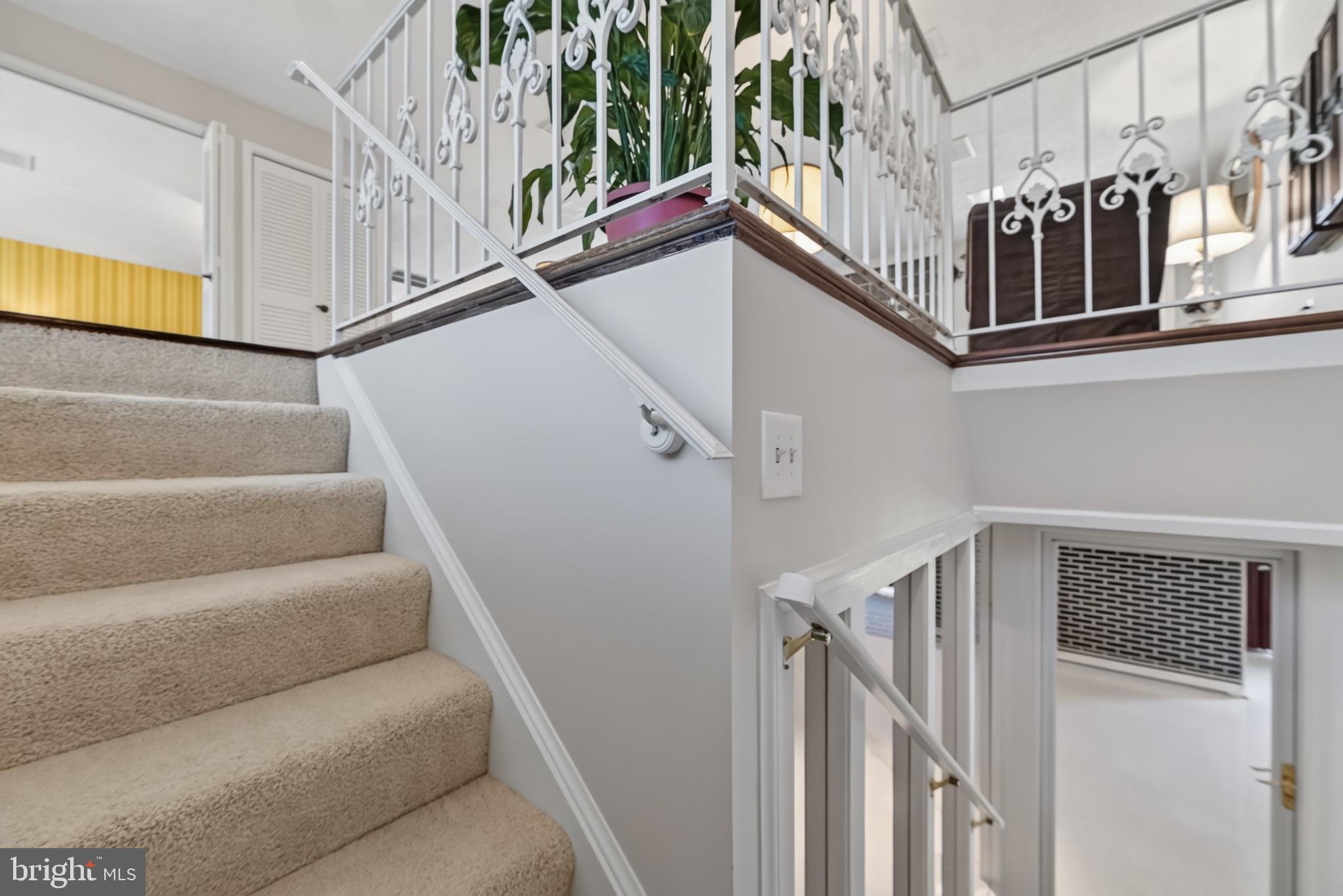 4212 Dustin Road Burtonsville, MD 20866 - Photo 36 of 65 Inviting staircase with elegant railings.