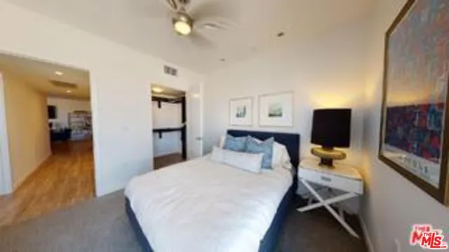 a swimming pool view with outdoor seating