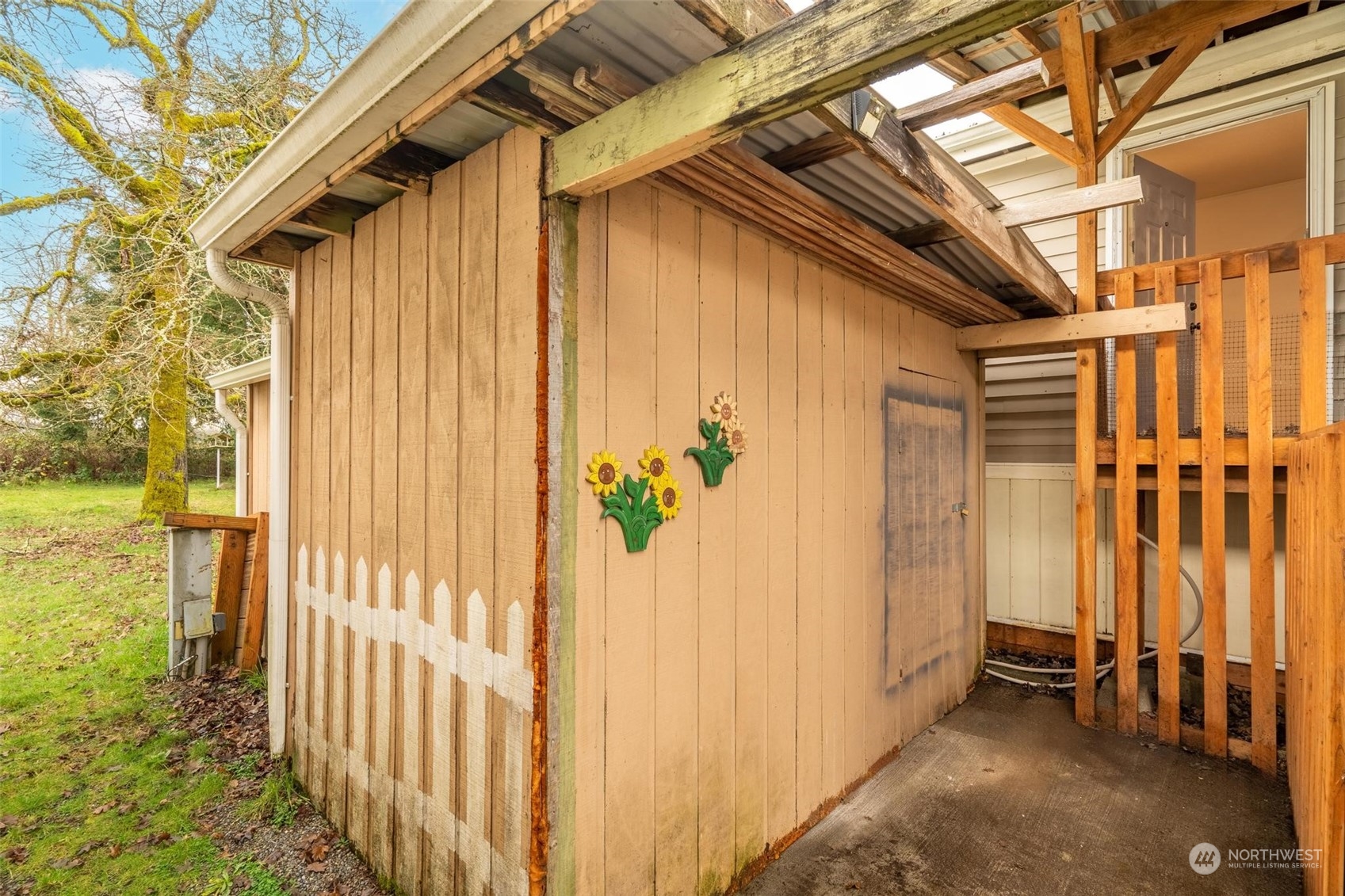 10239 185th Avenue Southwest, Unit 54 Rochester, WA 98579 - Photo 20 of 24 a view of a porch with a door and wooden floor