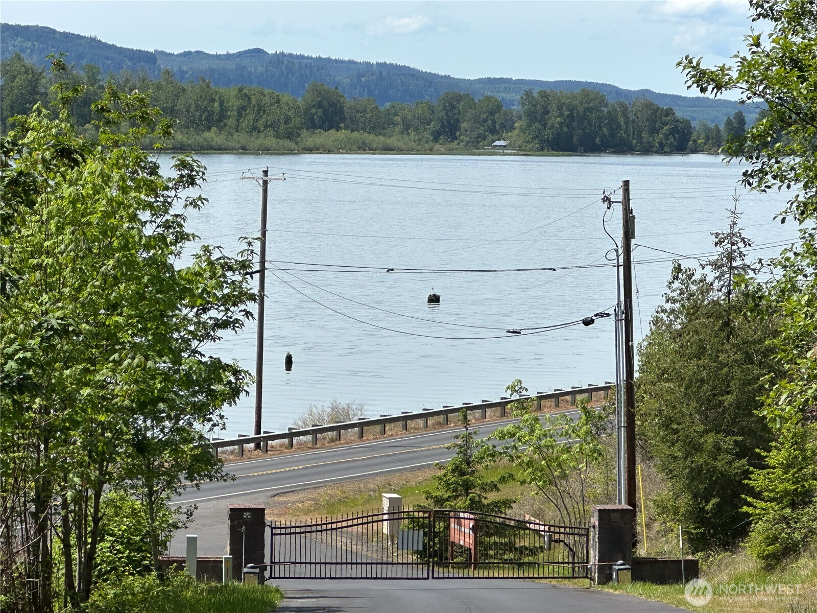 0 Maple Ridge Road Cathlamet, WA 98612 - Photo 12 of 12 a view of a lake with a mountain in the background
