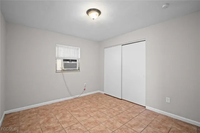 a view of a room with a large window