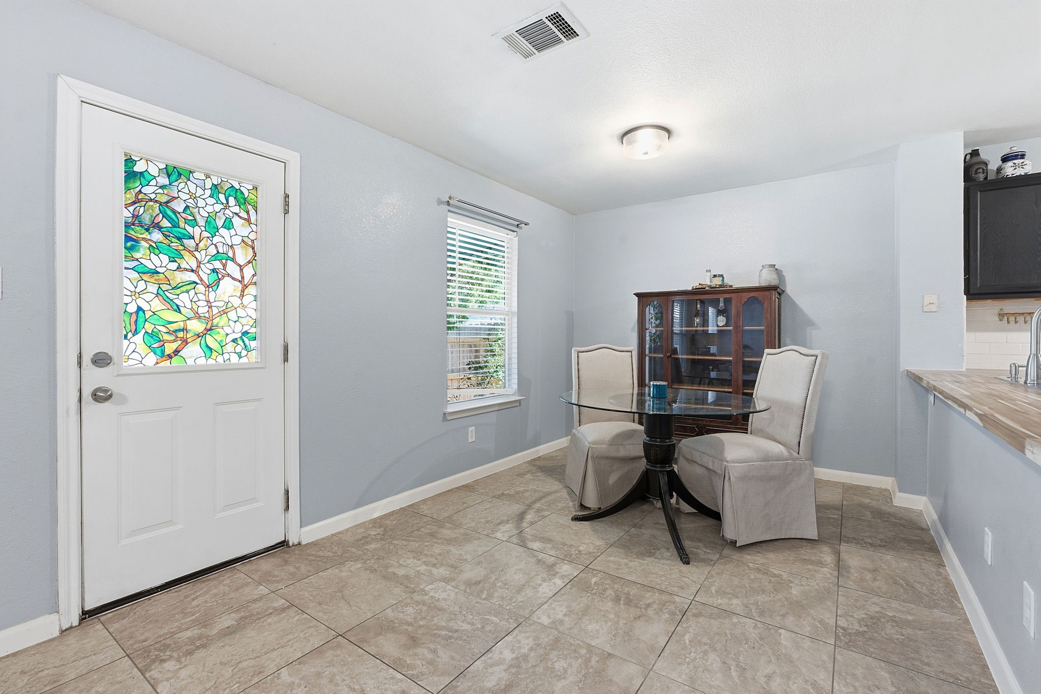 229 Black Forest Road Buda, TX 78610 - Photo 10 of 32 Breakfast area features lots of windows for natural light and a cozy spot to sit and enjoy your morning coffee.