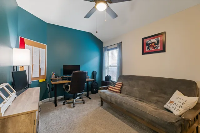 a en suite bathroom with a double sink and mirror
