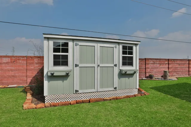 a house view with a garden space